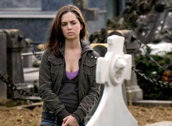 Eliza Dushku pouting in cemetery